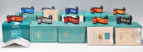 A group of ten Walt Disney  Classics collection ceramic 'Opening Title' ceramic ornaments to include