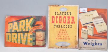 A group of three vintage retro cardboard shop display counter top advertising signs to include