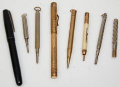 A group of vintage propelling pencils to include a rolled gold example with engine turned