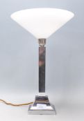 A good vintage 20th Century Art Deco chrome table lamp raised on a stepped base having a white glass