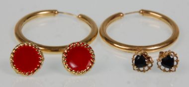 A pair of stamped 375 9ct gold hoop earrings, together with a pair of 9ct gold stud earrings set