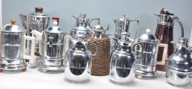 A fab group of mixed chrome flask / thermos / kettles with many made by Thermos, a kettle made by