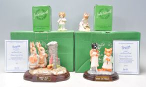 A good group of four Beswick Beatrix Potter porcelain figures to include Hiding From The Cat 63/3500