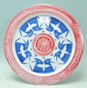 A vintage retro 1970's studio art pottery plate by Laurence McGowan studio pottery wall charger