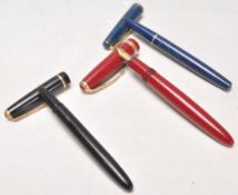 A group of three vintage Parker writing / fountain ink pens, two having integrated nibs, the third