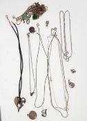 A mixed group of silver chain necklaces and pendants to include snake and box link chain examples,
