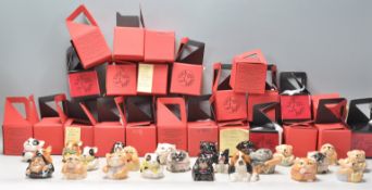 A collection of twenty four ceramic Kevin Francis face pots to include Spiro dog, Rex the Corgi,