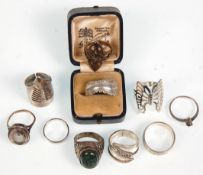 A group of ten silver ladies rings to include a butterfly ring and another decorative claw ring,