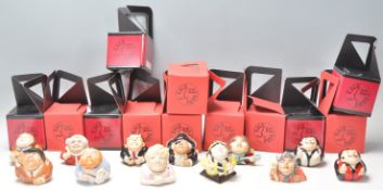 A group of twelve Kevin Francis ceramic face pots in the form of celebrity characters to include Van