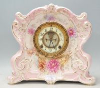 A 19th Century Victorian large Royal Bonn porcelain cased mantel clock of scrolled form with pink