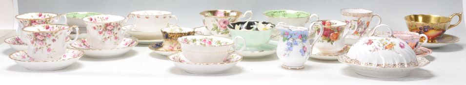 A collection of various vintage 20th Century bone china tea cups and saucers to include Royal Albert