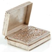 An unmarked but tests as silver vinaigrette of rectangular form having hinged lid revealing