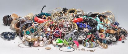 A large collection of vintage 20th Century costume jewellery to include a wide selection of beaded