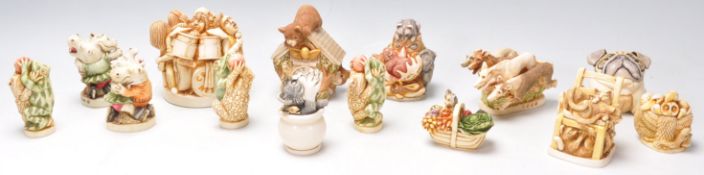 A group of fourteen Harmony Kingdom resin figurines in the form of animals to include racing