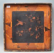 A good vintage 20th Century Chinese lacquered tray having inlaid border around a black panel