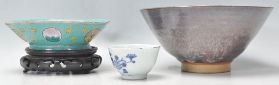 A group of Chinese ceramics to include a stoneware conical form bowl, a 19th Century blue and