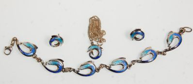 A silver hallmarked and enamelled demi-parure necklace, bracelet and earrings set in the the form of