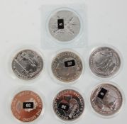A group of seven fine silver British coins to include 2x £2 1oz 2014 Britannia coins with examples