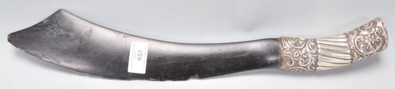 A 19th Century Victorian decorative knife having a curved ebonised wooden blade with a silver handle