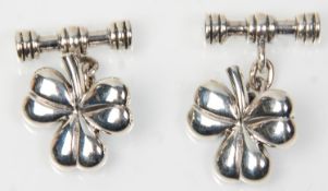 A pair of stamped 925 silver gentleman's cufflinks having heads in the form of three leaved
