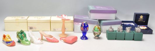 A mixed group of mostly resin ornaments to include various ladies shoes, decorative egg ornaments