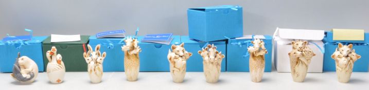 A collection of Adam Binder animals related netsuke style figurines to include a group of ducks,