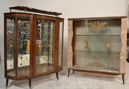 A 1930's Art Deco display cabinet with mirror back