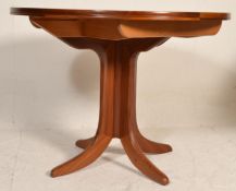 A retro mid century Nathan teak wood circular pede