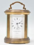 A 20th Century Matthew Norman of London oval brass