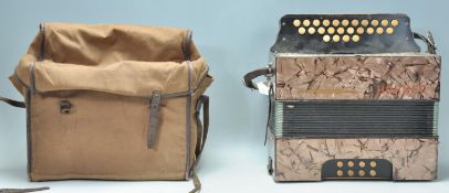 A vintage 20th Century Hohner made accordion havin