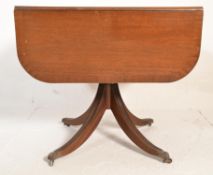 A 20th century Regency revival drop leaf sofa tabl