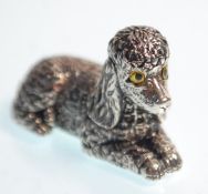 A  stamped sterling silver figurine in the form of