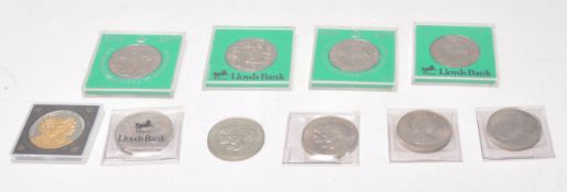 A collection of commemorative coins to include fou