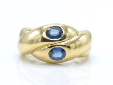 A French 18ct gold and sapphire snake ring