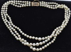 A 9ct yellow gold sapphire and pearl choker necklace.