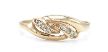 A 14ct rose gold and white stone ring.