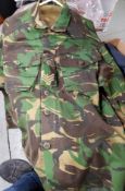 UNIFORMS & FANCY DRESS - A COLLECTION OF CAMOUFLAGE COMBAT JACKETS AND A HAT.