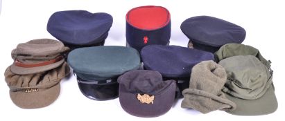 UNIFORMS AND FANCY DRESS - A COLECTION OF ASSORTED MILITARY RELATED HATS.