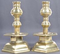 A PAIR OF 18TH CENTURY GEORGIAN ENGLISH HEAVY BRASS TABLE CANDLESTICKS