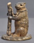 19TH CENTURY ANTIQUE DANCING BEAR CUB MATCH STRIKE