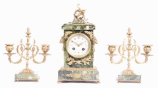 JAPY FRERES FRENCH GREEN MARBLE AND ORMOLU CLOCK AND GARNITURE SET