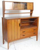 A retro mid century teak wood sideboard credenza.