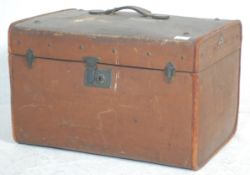 A vintage early 20th Century travelling trunk boun