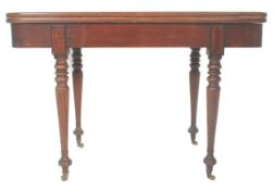 A 19th Century mahogany card / tea table having a