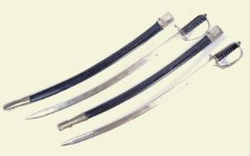 PAIR OF EARLY-MID 20TH CENTURY INDIAN CEREMONIAL SWORDS