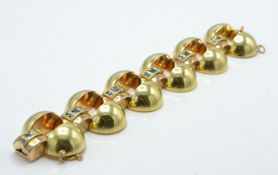 A large French retro 18ct gold and aquamarine brac