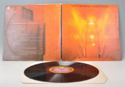 A vinyl long play LP record album by the Principal Edwards Magic Band – The Asmoto Running Band –