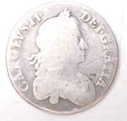 A 17th Century Charles II silver crown coin with a rubbed date (168?), poor condition. Weight 28.7g.