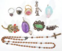 A collection of silver and white metal jewellery. To include a Chinese jade hardstone and filigree