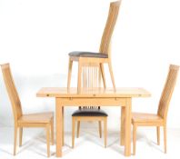 A modern contemporary hardwood DFS extending refectory dining room suite comprising a rectangular